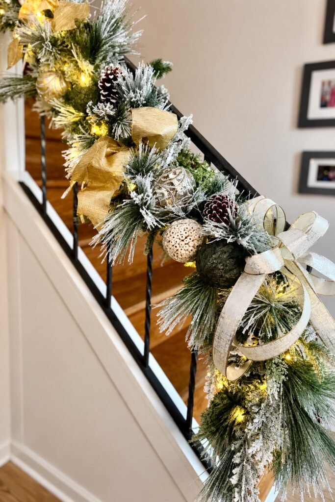 Holiday staircase garland with evergreens and ornaments